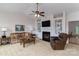 Cozy living room with fireplace, built-in shelving, and plush seating, creating a relaxing atmosphere at 8593 Bailey Dr, Terrell, NC 28682
