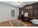 Home office with custom built-ins, hardwood floors and large window at 8593 Bailey Dr, Terrell, NC 28682