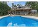 Backyard pool with multi-tiered deck perfect for outdoor entertaining and relaxing at 8593 Bailey Dr, Terrell, NC 28682