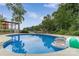 Inviting backyard pool with lake views, ideal for summer fun and relaxation at 8593 Bailey Dr, Terrell, NC 28682