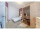 Charming bedroom boasts a wooden sauna, plush bed, and calming atmosphere at 901 Clearbrook Rd, Matthews, NC 28105