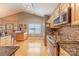 Cozy kitchen featuring stainless steel appliances, granite counters, and plenty of cabinet space at 901 Clearbrook Rd, Matthews, NC 28105