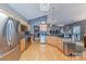 Bright kitchen featuring stainless steel appliances, granite countertops, and a decorative skylight at 901 Clearbrook Rd, Matthews, NC 28105