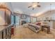 Spacious living room featuring a fireplace, plush seating, and access to the dining area at 901 Clearbrook Rd, Matthews, NC 28105