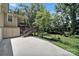 Spacious backyard features a well-maintained lawn and inviting patio and deck with stairs at 926 Meadow Lakes Rd, Rock Hill, SC 29732