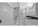 Bathroom with a shower-tub combo, storage vanity, and tiled wall at 926 Meadow Lakes Rd, Rock Hill, SC 29732