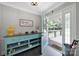 Stylish entryway featuring a unique turquoise console table, tiled floor, and natural light at 926 Meadow Lakes Rd, Rock Hill, SC 29732