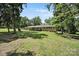 Charming home featuring a welcoming front deck and lush, tree-filled surroundings at 926 Meadow Lakes Rd, Rock Hill, SC 29732