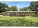 Inviting single-story home with a spacious front yard and a cozy outdoor deck at 926 Meadow Lakes Rd, Rock Hill, SC 29732