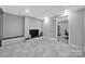 Basement living space featuring brick fireplace at 926 Meadow Lakes Rd, Rock Hill, SC 29732