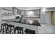 Basement kitchen with granite counters, stainless appliances and bar seating at 926 Meadow Lakes Rd, Rock Hill, SC 29732