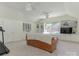 Spacious bonus room offering built-in shelving and a comfortable seating area with natural lighting at 9622 Penshurst Trce, Charlotte, NC 28210