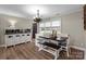 Cozy dining room with built-in bench seating and natural light at 10637 Highway 52 Hwy, Rockwell, NC 28138