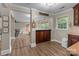 Open kitchen area with hardwood floors and abundant natural light at 10637 Highway 52 Hwy, Rockwell, NC 28138
