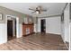 Inviting living room featuring a brick fireplace and neutral color scheme at 10637 Highway 52 Hwy, Rockwell, NC 28138