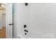 Clean bathroom showcasing a tiled shower with modern fixtures at 1106 S South St, Gastonia, NC 28052