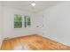 Cozy bedroom with natural lighting and ceiling fan, ideal for relaxation at 1106 S South St, Gastonia, NC 28052
