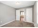 Comfortable bedroom with carpet and a convenient adjoining door at 113 W 5Th Ave, Gastonia, NC 28052