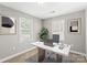 Cozy home office with carpet, natural light, and modern decor at 113 W 5Th Ave, Gastonia, NC 28052