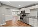 Modern kitchen with stainless steel appliances and granite countertops at 113 W 5Th Ave, Gastonia, NC 28052