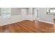 Bright open space boasts hardwood flooring and fresh paint at 113 W 5Th Ave, Gastonia, NC 28052
