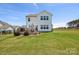 Beautiful backyard featuring a patio, lawn, and privacy fence, creating a serene outdoor space at 12001 Sam Snead Ct, Lancaster, SC 29720