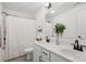 Bathroom featuring double sinks with matte black faucets and a shower/tub combo at 12001 Sam Snead Ct, Lancaster, SC 29720