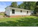 The backyard view of this cozy home at 1218 Milan Rd, Charlotte, NC 28216