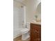 Bathroom features shower-tub combination, with natural light and modern vanity at 1218 Milan Rd, Charlotte, NC 28216