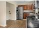 Functional kitchen with stainless steel refrigerator and plentiful cabinets at 1218 Milan Rd, Charlotte, NC 28216