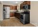 Updated kitchen featuring stainless steel appliances and ample cabinet space at 1218 Milan Rd, Charlotte, NC 28216