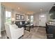 Inviting living room with a comfortable sofa, accent chairs, and a view of the front entry at 124 Kristin View Ln # Townhome A, Troutman, NC 28166