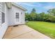 Back patio with sliding glass door leading to a spacious, well-maintained backyard at 130 24Th Nw St, Hickory, NC 28601