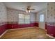 Cozy dining area featuring vinyl flooring, a large window, and a door to the exterior at 130 24Th Nw St, Hickory, NC 28601