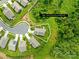 Aerial view of property showcasing the home's placement on a ~0.23 acre lot, near green space and adjacent to a cul-de-sac at 138 Chase Water Dr, Mooresville, NC 28117