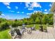 Relaxing backyard with brick patio, fire pit area and lush green lawn at 138 Chase Water Dr, Mooresville, NC 28117