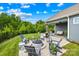 Beautifully landscaped backyard with patio, fire pit and ample space for outdoor enjoyment at 138 Chase Water Dr, Mooresville, NC 28117