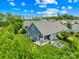 This home features a spacious backyard patio with outdoor seating and a fire pit perfect for entertaining or relaxing outdoors at 138 Chase Water Dr, Mooresville, NC 28117