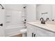Bathroom featuring modern fixtures, vanity with a quartz countertop, and tub with shower at 1420 Tyler St, Kannapolis, NC 28083