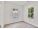 Bright bedroom featuring hard surface floors and verdant views at 1420 Tyler St, Kannapolis, NC 28083