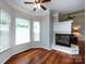 Comfortable living room with a corner fireplace at 1423 Piper Ct, Concord, NC 28025
