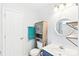 Bright bathroom features modern vanity, round mirror, and built-in storage at 1515 Kingdom Way, Fort Mill, SC 29707
