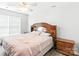 Cozy bedroom features a decorative headboard and a ceiling fan at 1515 Kingdom Way, Fort Mill, SC 29707