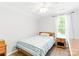 Cozy bedroom features wood floors, a ceiling fan, natural light, and modern décor at 1515 Kingdom Way, Fort Mill, SC 29707