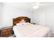 Comfortable bedroom features a wood headboard and ample natural light at 1515 Kingdom Way, Fort Mill, SC 29707