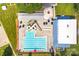 Aerial view of a resort-style community pool with slides and ample lounge seating at 1515 Kingdom Way, Fort Mill, SC 29707