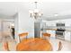 Bright dining area adjacent to a modern kitchen, perfect for entertaining, with a round table at 1515 Kingdom Way, Fort Mill, SC 29707