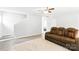 The spacious living room features neutral walls, hardwood floors, and a comfortable sofa at 1515 Kingdom Way, Fort Mill, SC 29707