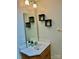 Bright bathroom with a mirror and white countertop at 1700 Pickwick Ave, Kannapolis, NC 28083