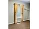 Neutral bedroom with patterned curtains on the window, carpet, and a vent in the floor at 1700 Pickwick Ave, Kannapolis, NC 28083